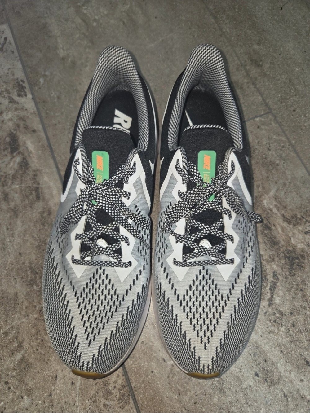 - Nike Men’s Gray and Black Athletic Running Shoes with Green Tongue Accents